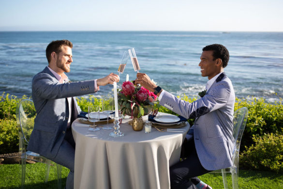 Queer SLO Renoda Campbell Photography Bryan and Nick cheers overlooking ocean